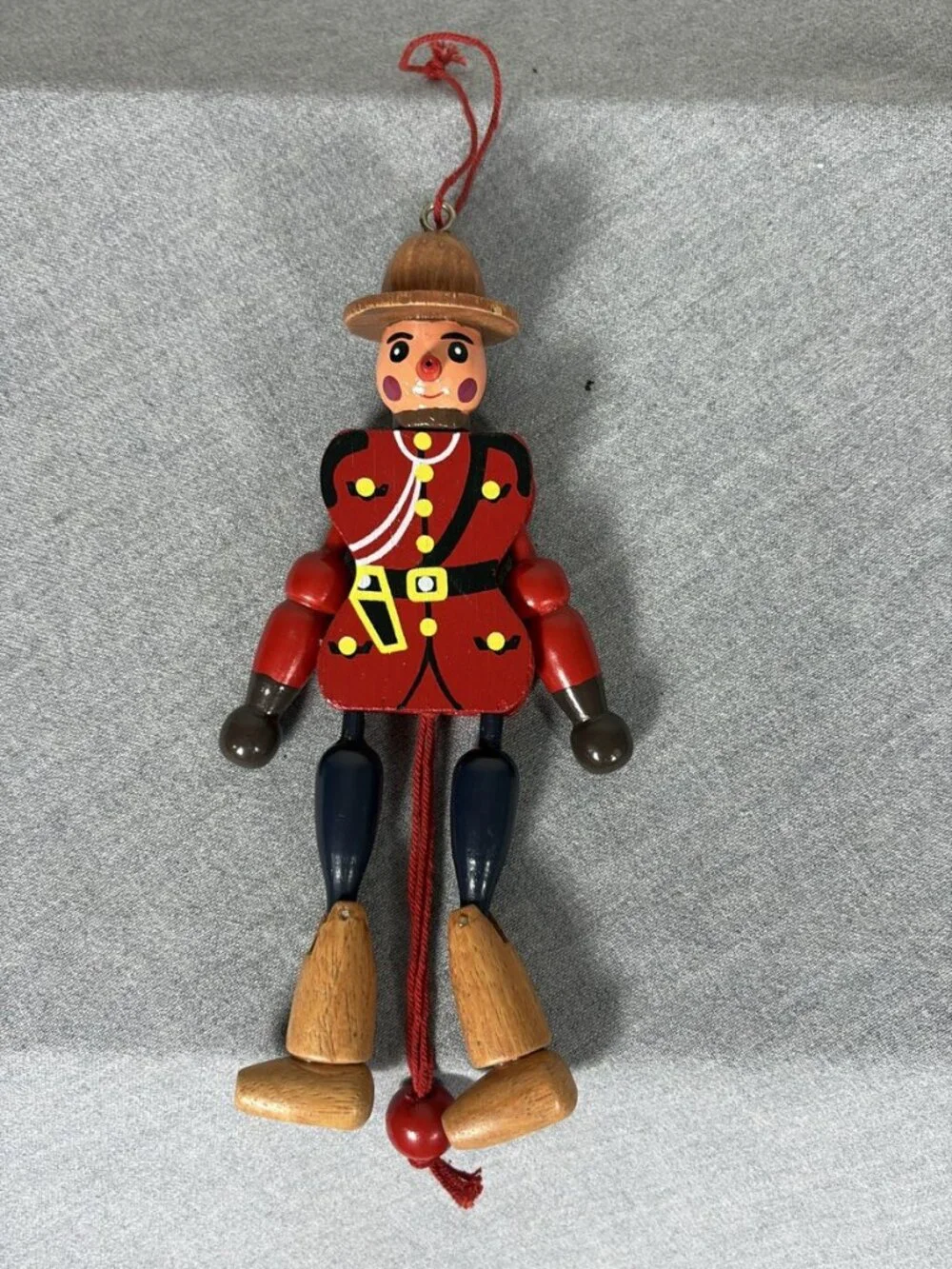 Wooden RCYMP Mountie Royal Canadian Mounted Police Jumping Jack Toy